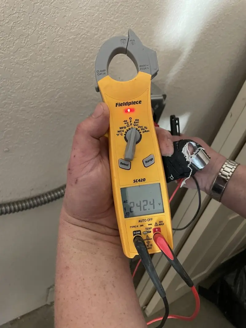 Voltage testing with clamp meter during Hot Tub / Pool Electrical Wiring in Coldwater